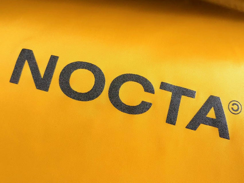 Jaqueta Nike x NOCTA Puffer "Yellow"