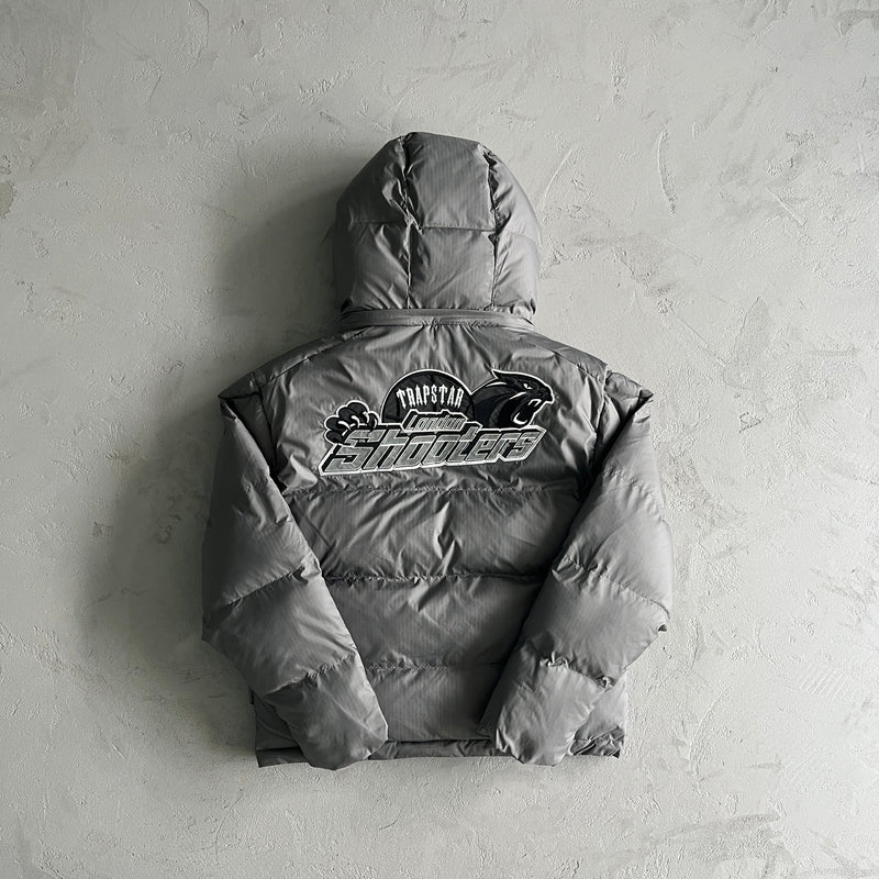 Jaqueta Trapstar “Shooters Detachable Hooded Puffer Grey”