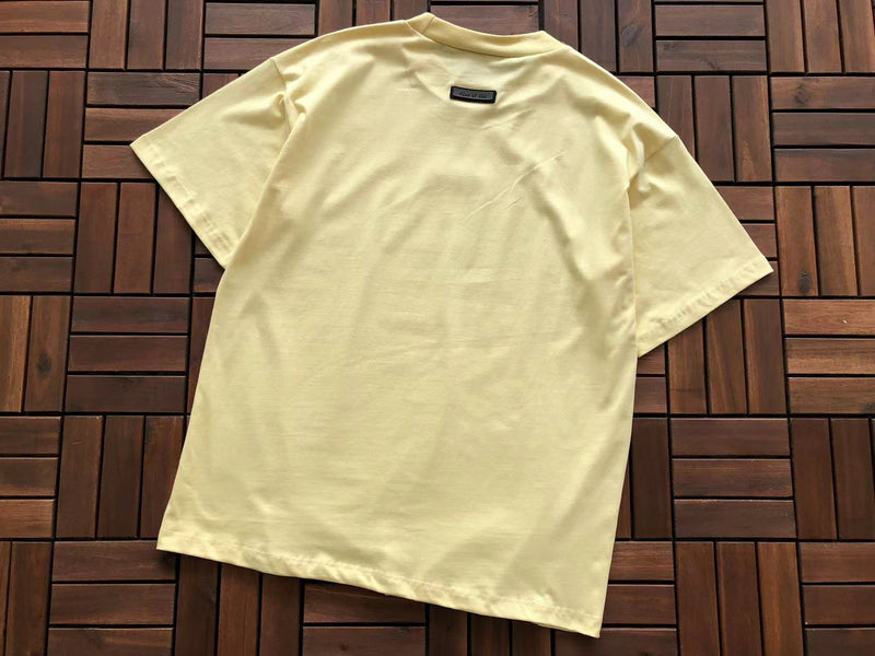 Camiseta Fear of God Essentials "S/S Yellow Leaf"