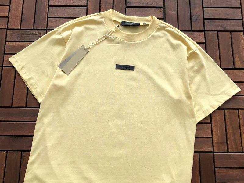 Camiseta Fear of God Essentials "S/S Yellow Leaf"