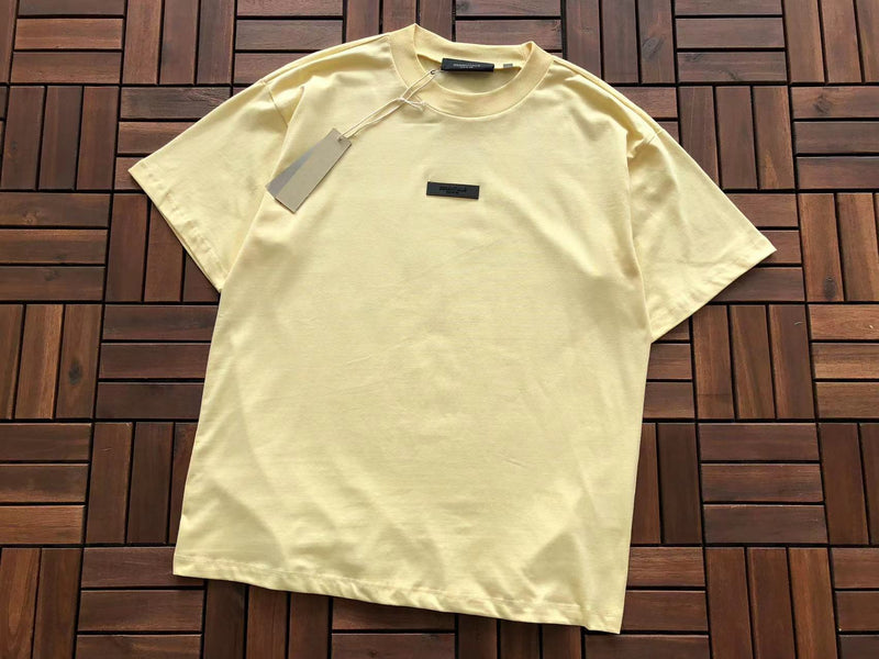 Camiseta Fear of God Essentials "S/S Yellow Leaf"